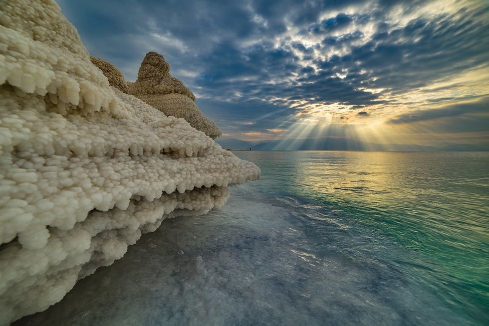 Salt formations that were until recently under water appear in all their glory as the water level of the Dead Sea recedes