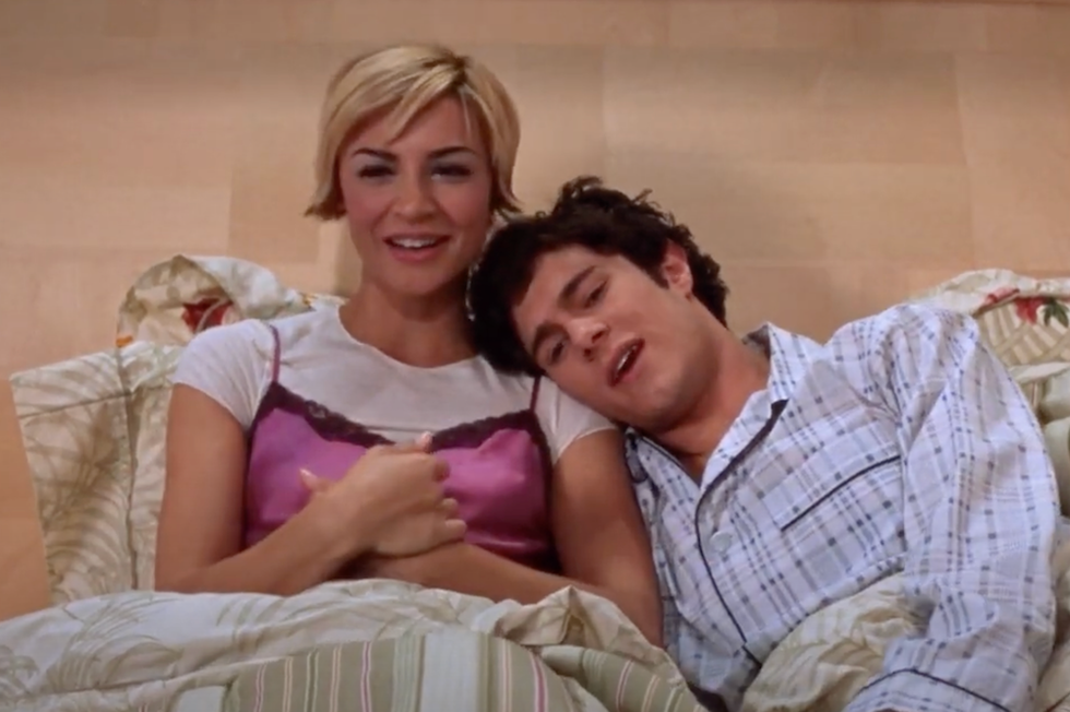 Samaire Armstrong as Anna Stern and Adam Brody as Seth Cohen in The O.C.