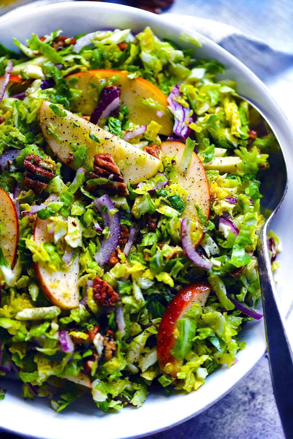 Shaved Brussel Sprouts Salad with Apples & Candied Pecans
