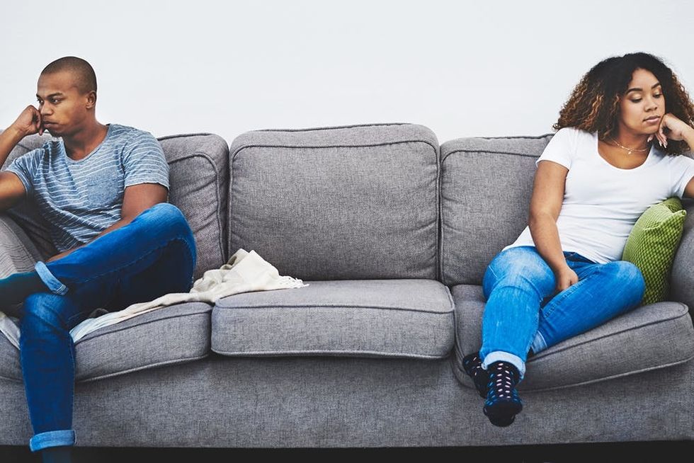 Shot of a young couple having relationship problems at home