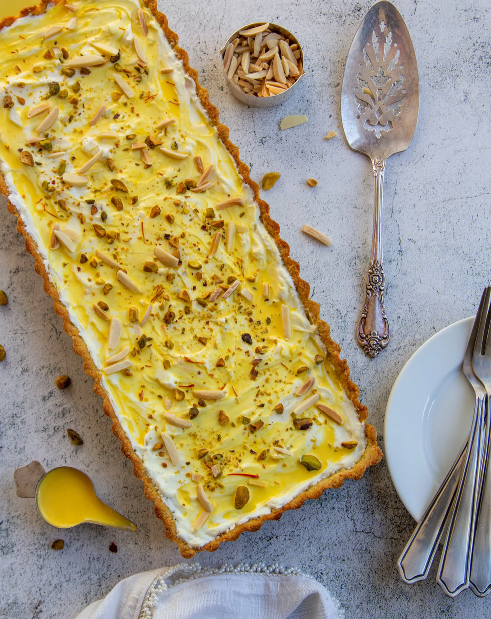 Shrikhand Tart plated with cutlery