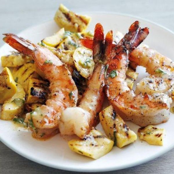 shrimp and squash on a white plate