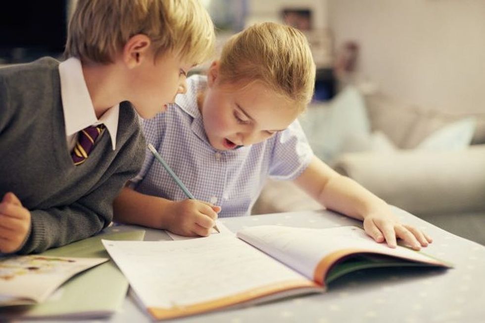Siblings doing homework