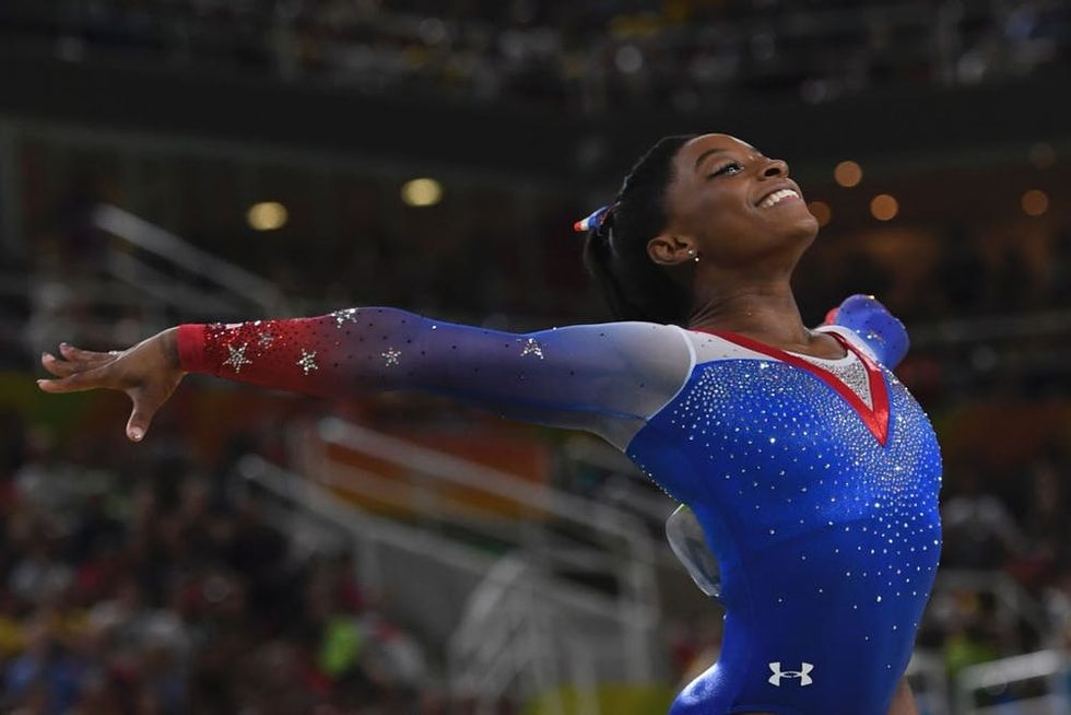 Simone Biles competes in the women's floor event final during the Rio 2016 Olympic Games