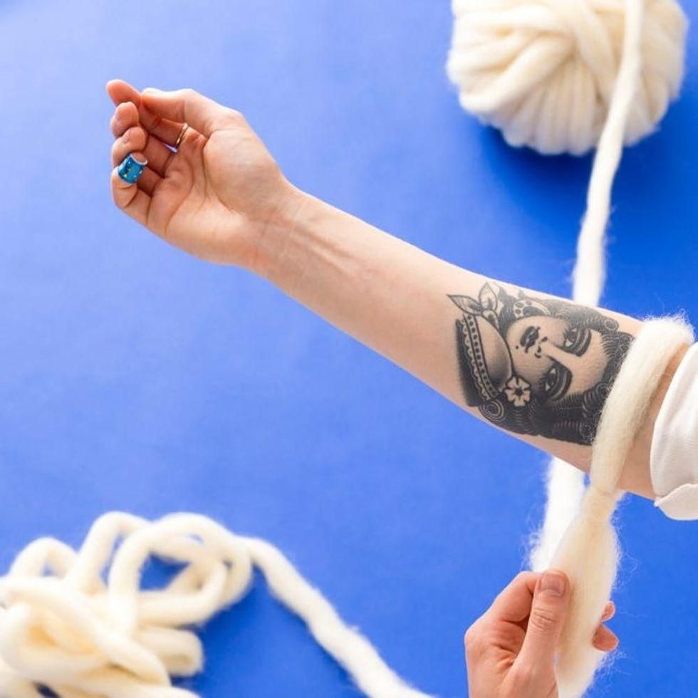 slide the stitch on your arm