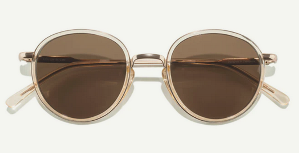 small, round frame sunglasses with sun protection