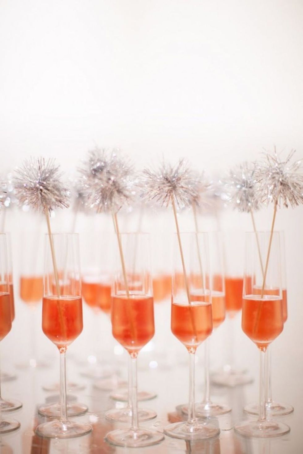 Sparkly Stirrers in a rose orange cocktail glass