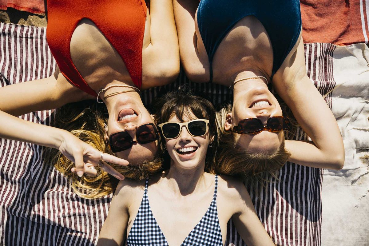 SPF three women sunbathing