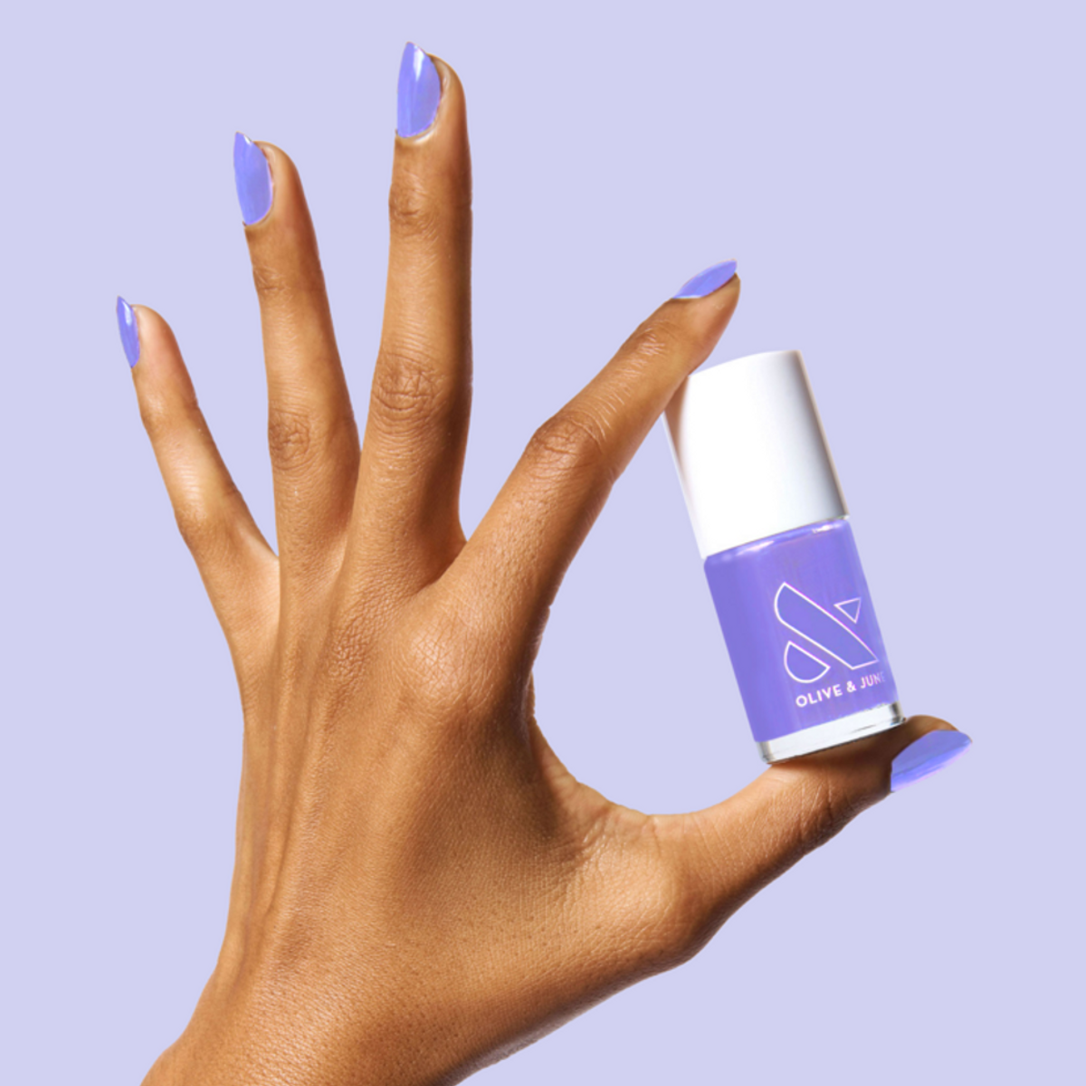 spring nail art ideas on a purple background