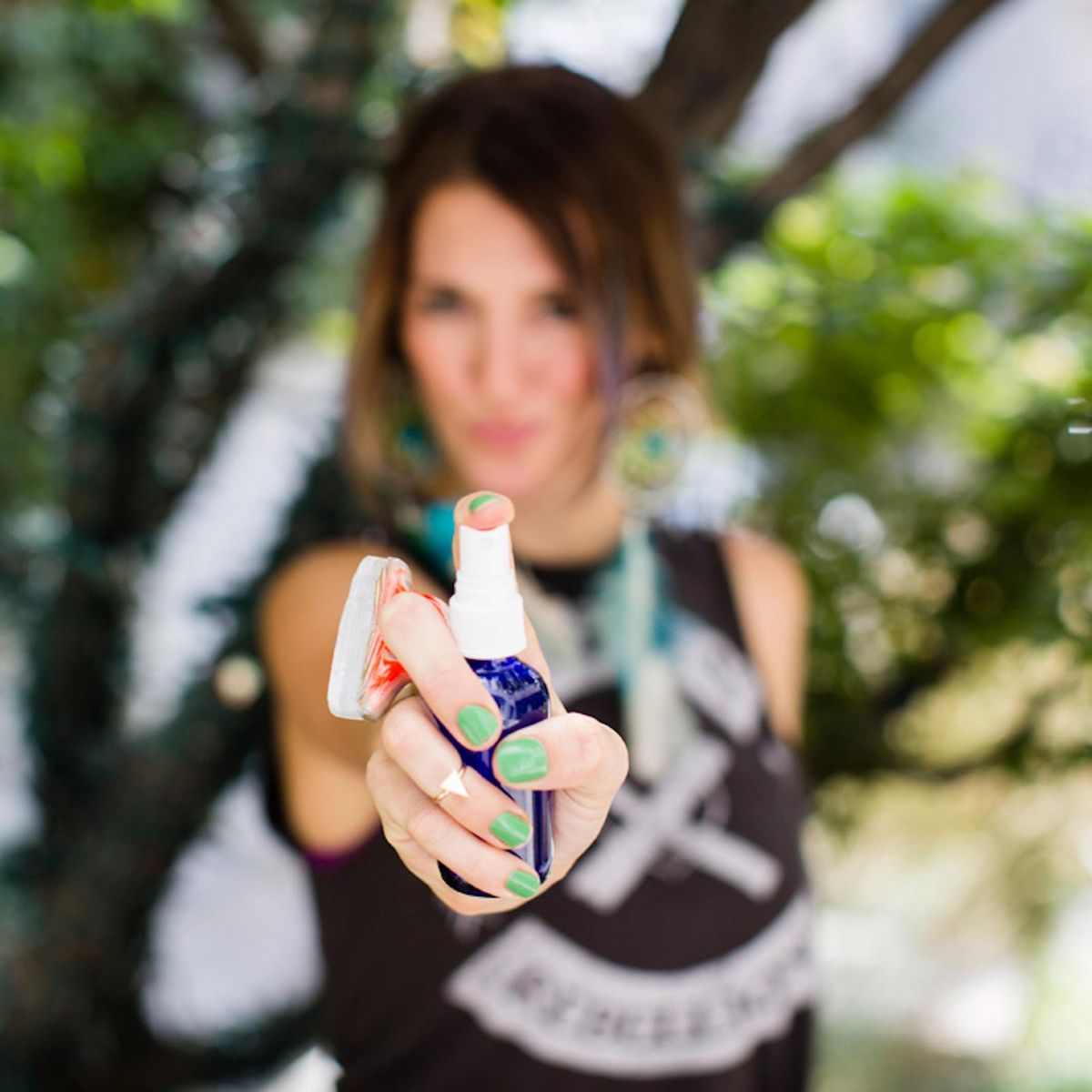 Spring Room Sprays spraying at the camera