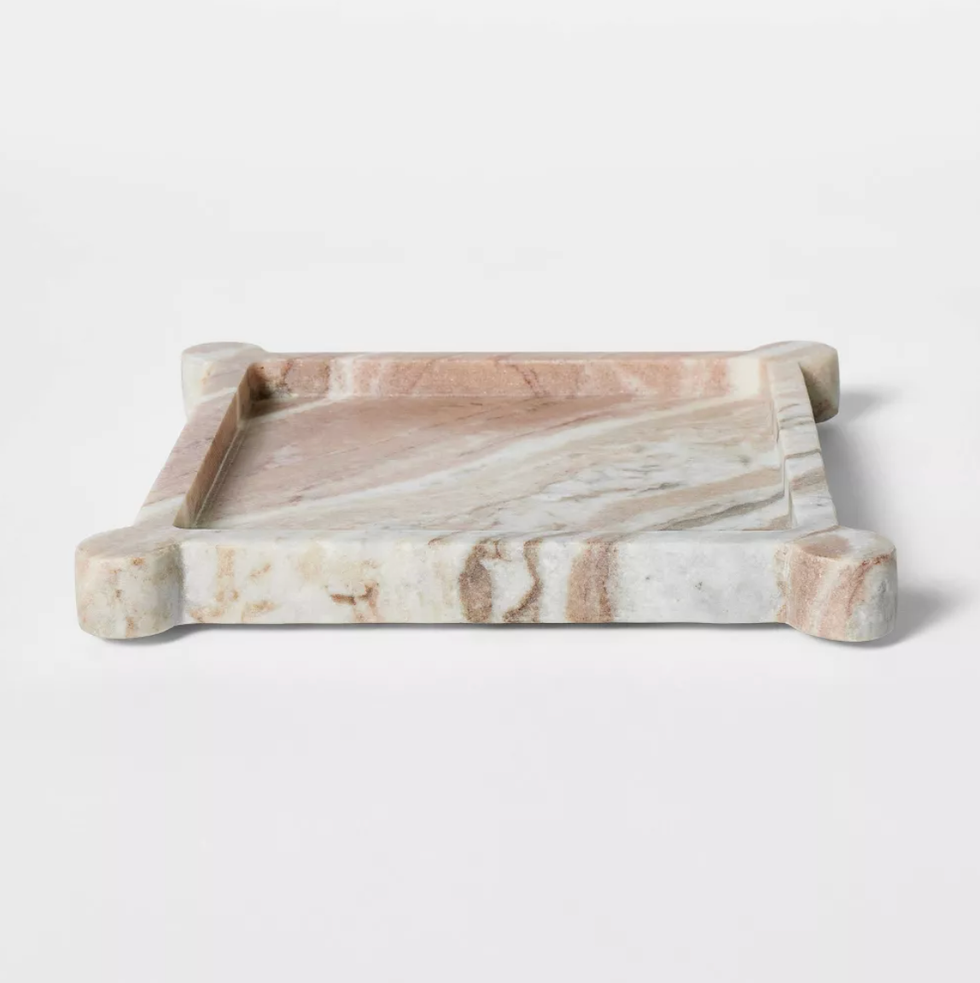 Square marble tray with rounded corner feet, brown and white veining.