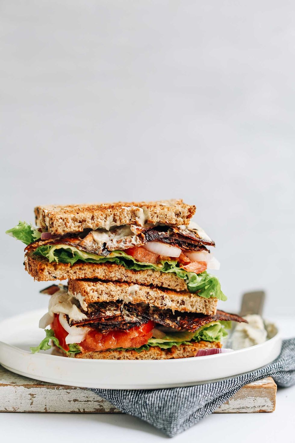 Stacked Vegan BLT Sandwich halves for a satisfying vegan lunch