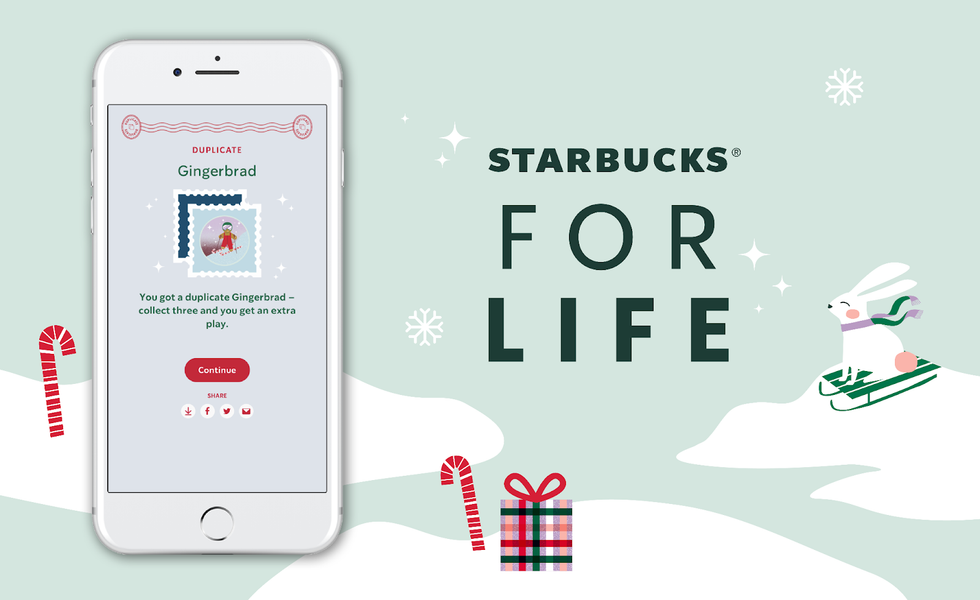 Starbucks app screen with snow, gifts, and a bunny sledding.