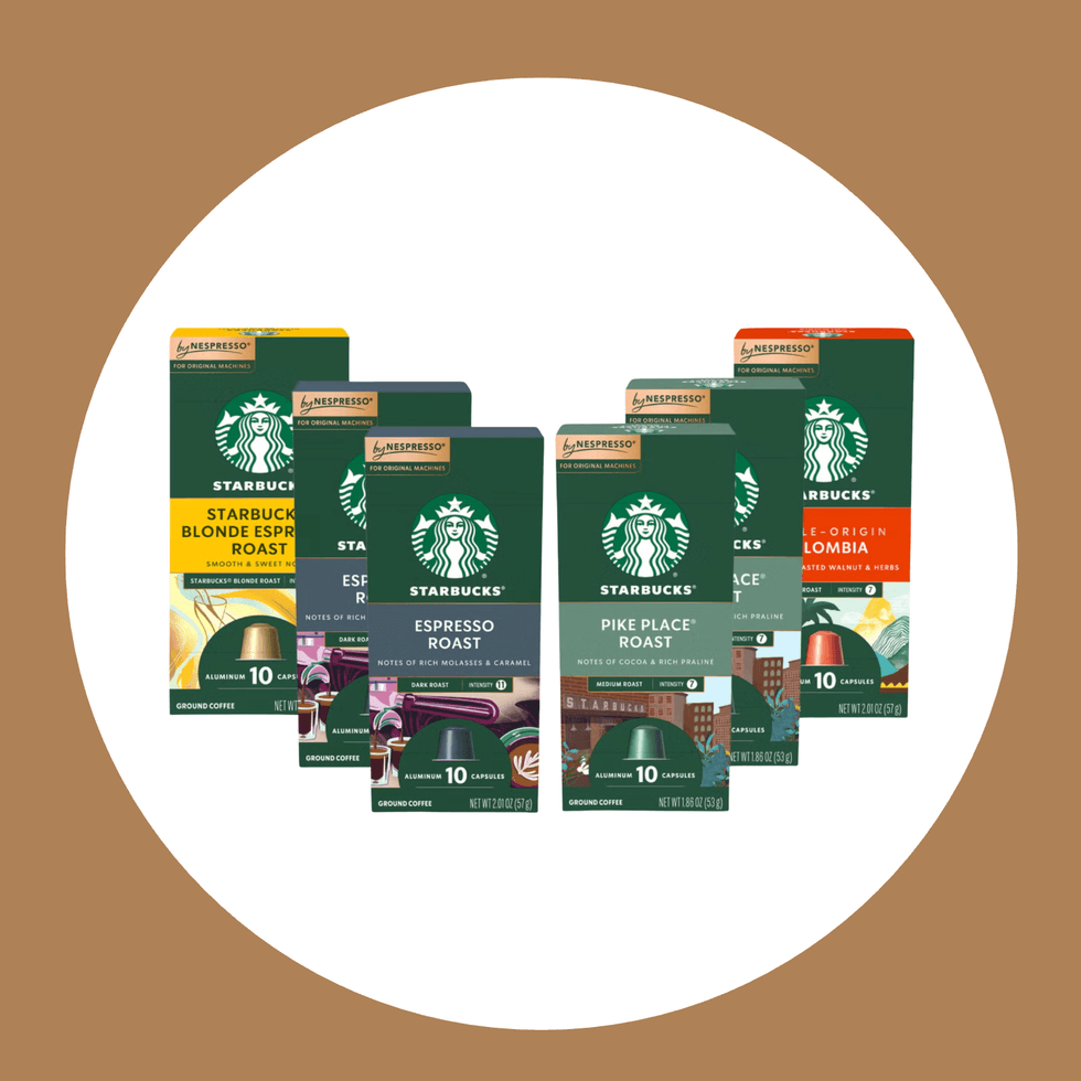Starbucks coffee capsules for Nespresso in assorted flavors on a brown and white background.