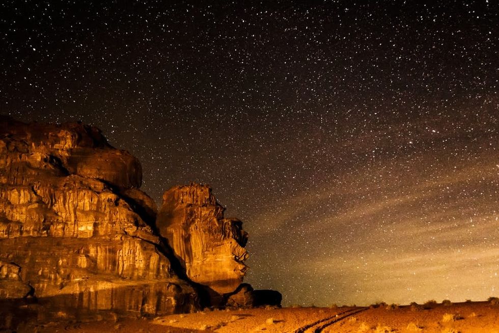 Stars fill the night sky over Wadi Rum