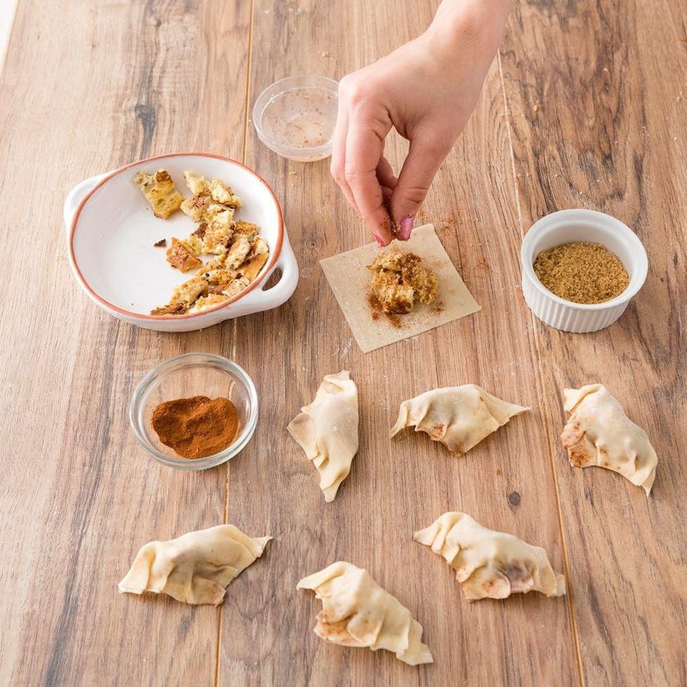 stuffing the wrappers with the French Toast ingredients