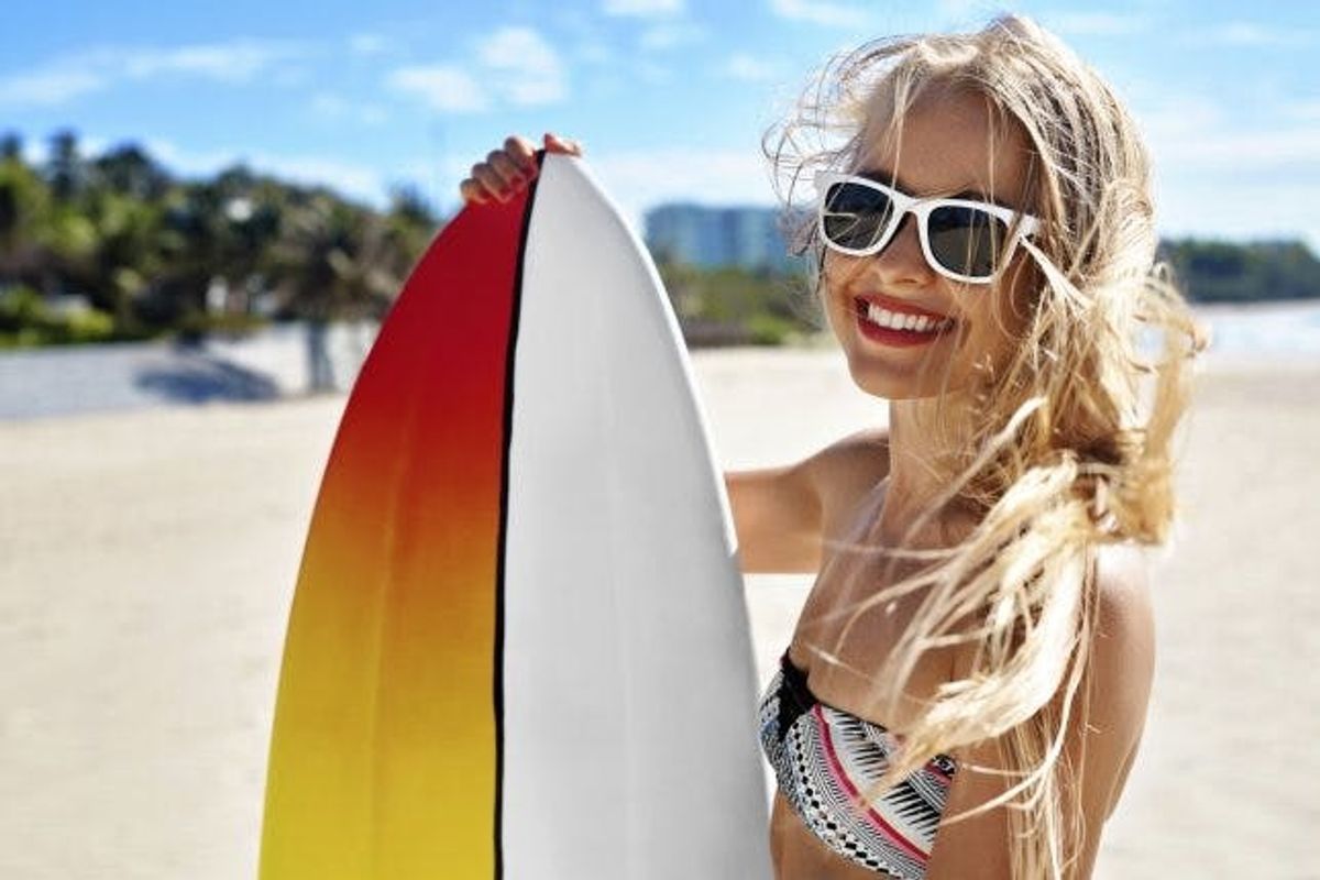 Summer Travel Beach Vacation. Happy Woman With Surfboard. Summer