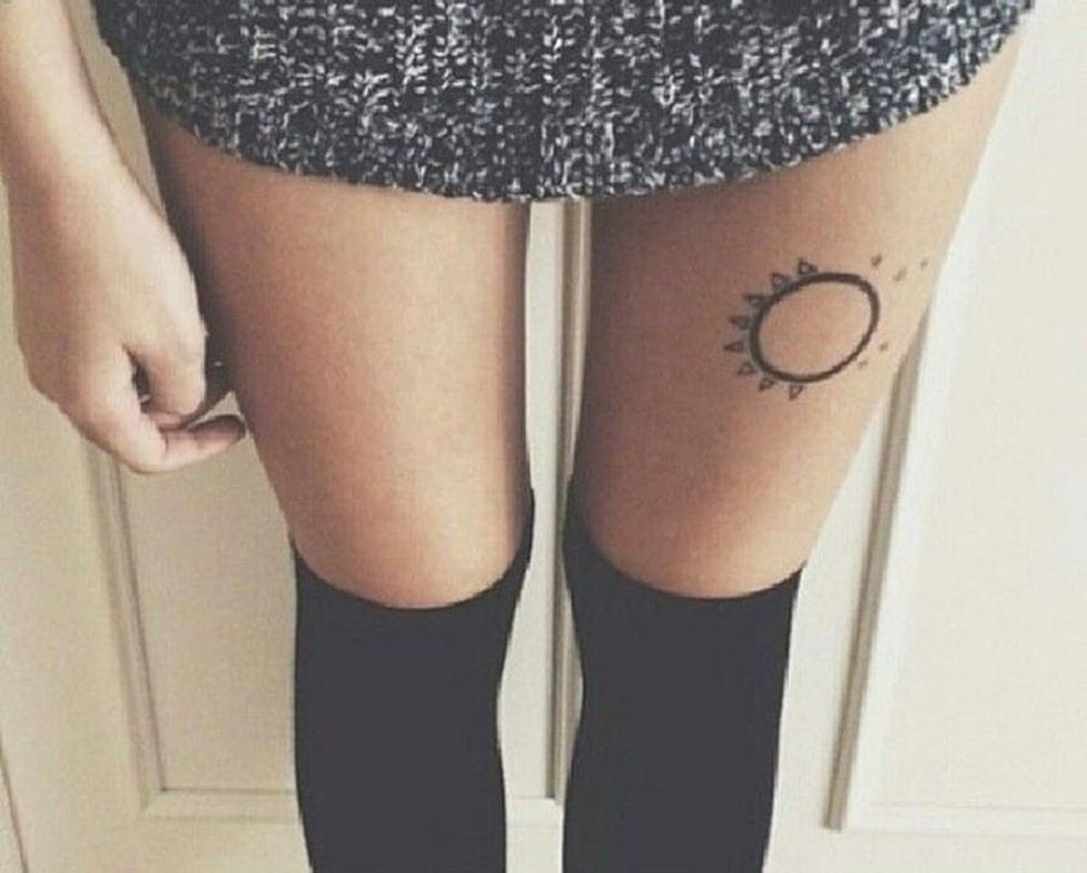 12 Pretty and Meaningful Thigh Tattoos Brit + Co