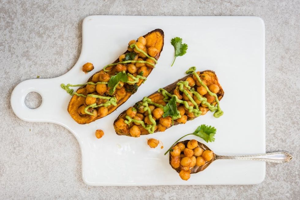 Sweet potato toast with spicy chickpeas and tangy avocado dressing. Quick, healthy, and delicious!