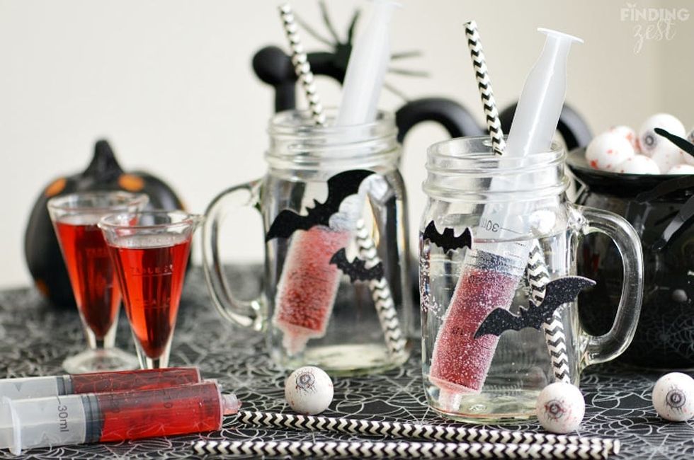 Syringes of bloodshot Halloween drinks