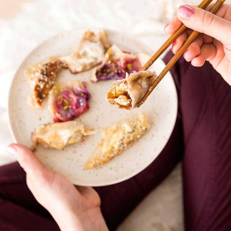 taking a bite out of the potstickers