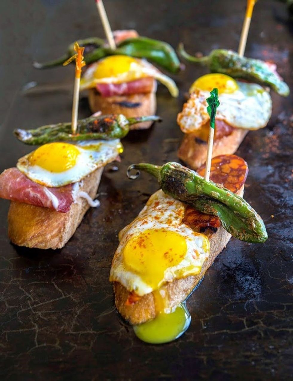 Tapa of Chorizo or Serrano Ham, Quail Egg and Padr\u00f3n