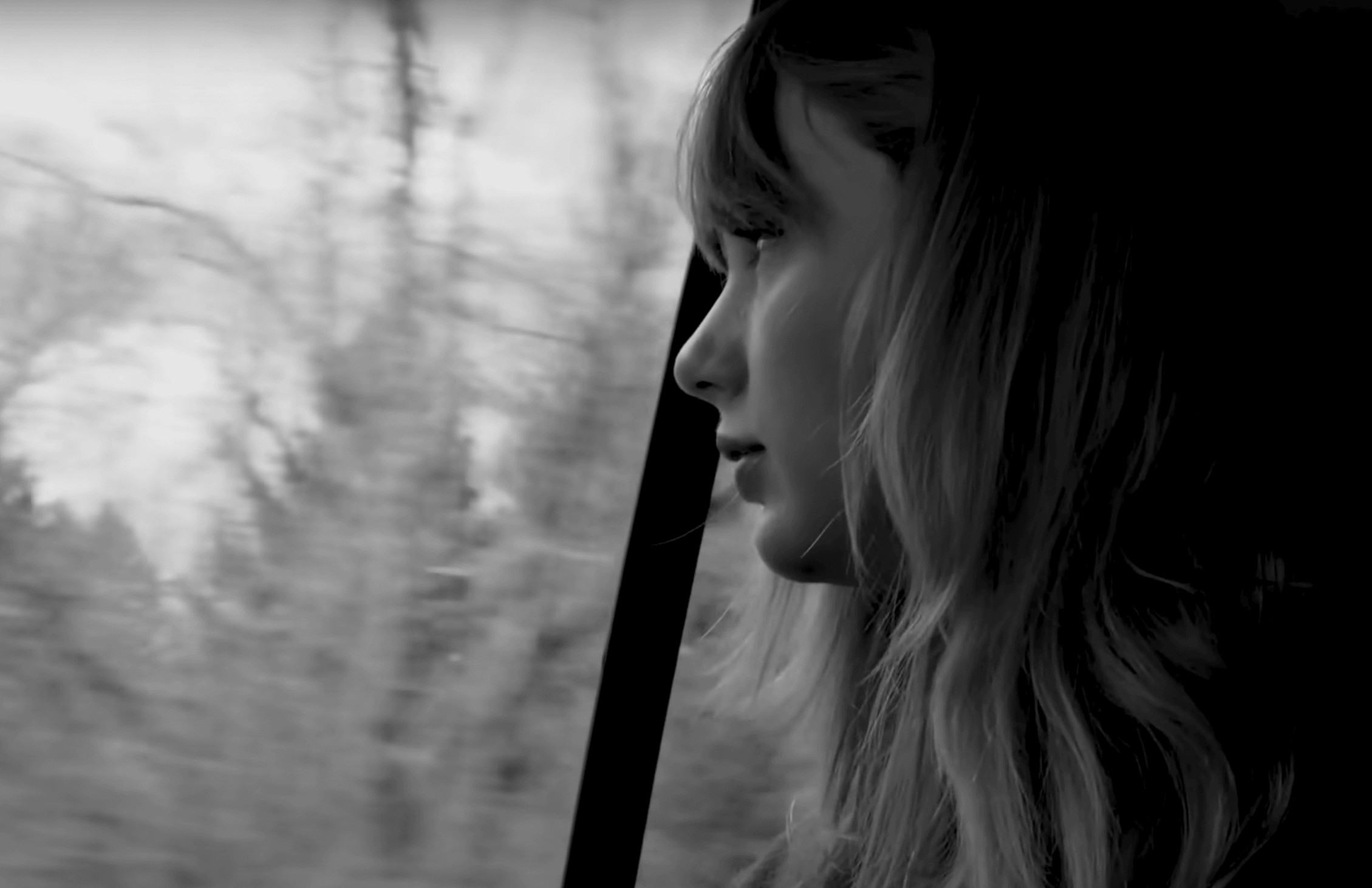 taylor swift in her music video for "christmas tree farm"