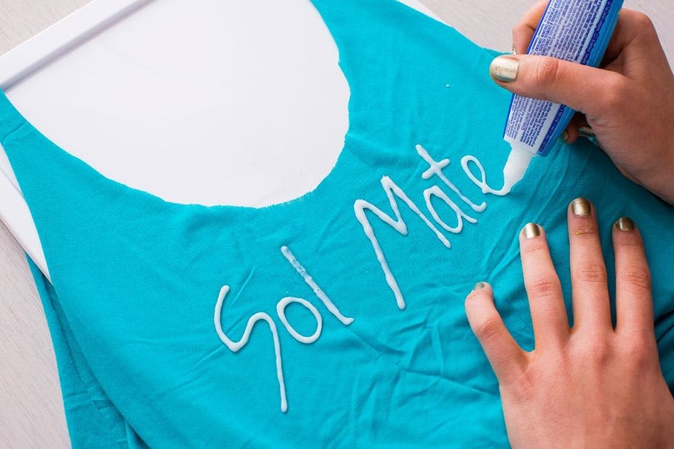 teal Beach_Cover_Ups_ with white writing