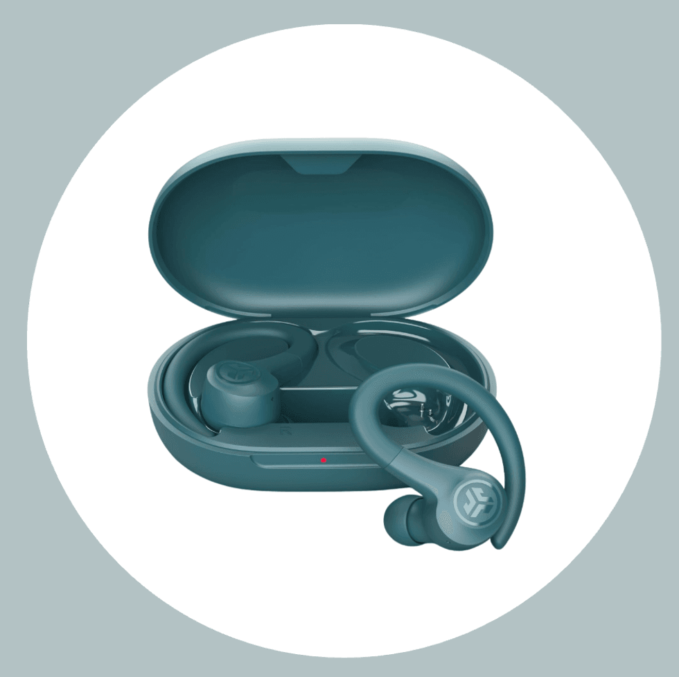 Teal wireless earbuds with ear hooks in an open charging case.