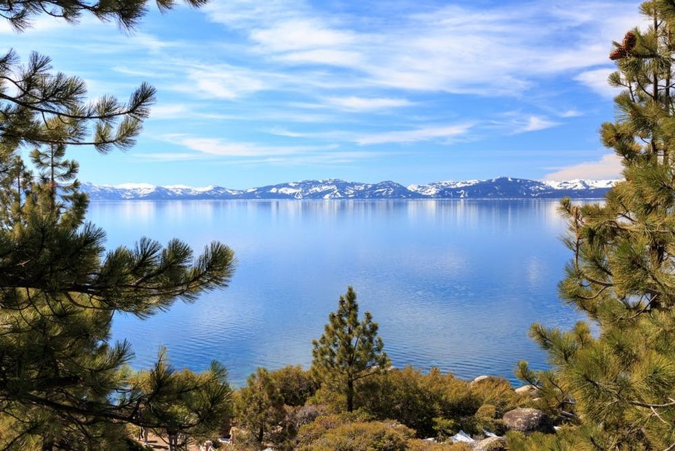 The lake peeps through the trees at Crystal Bay in Incline Village