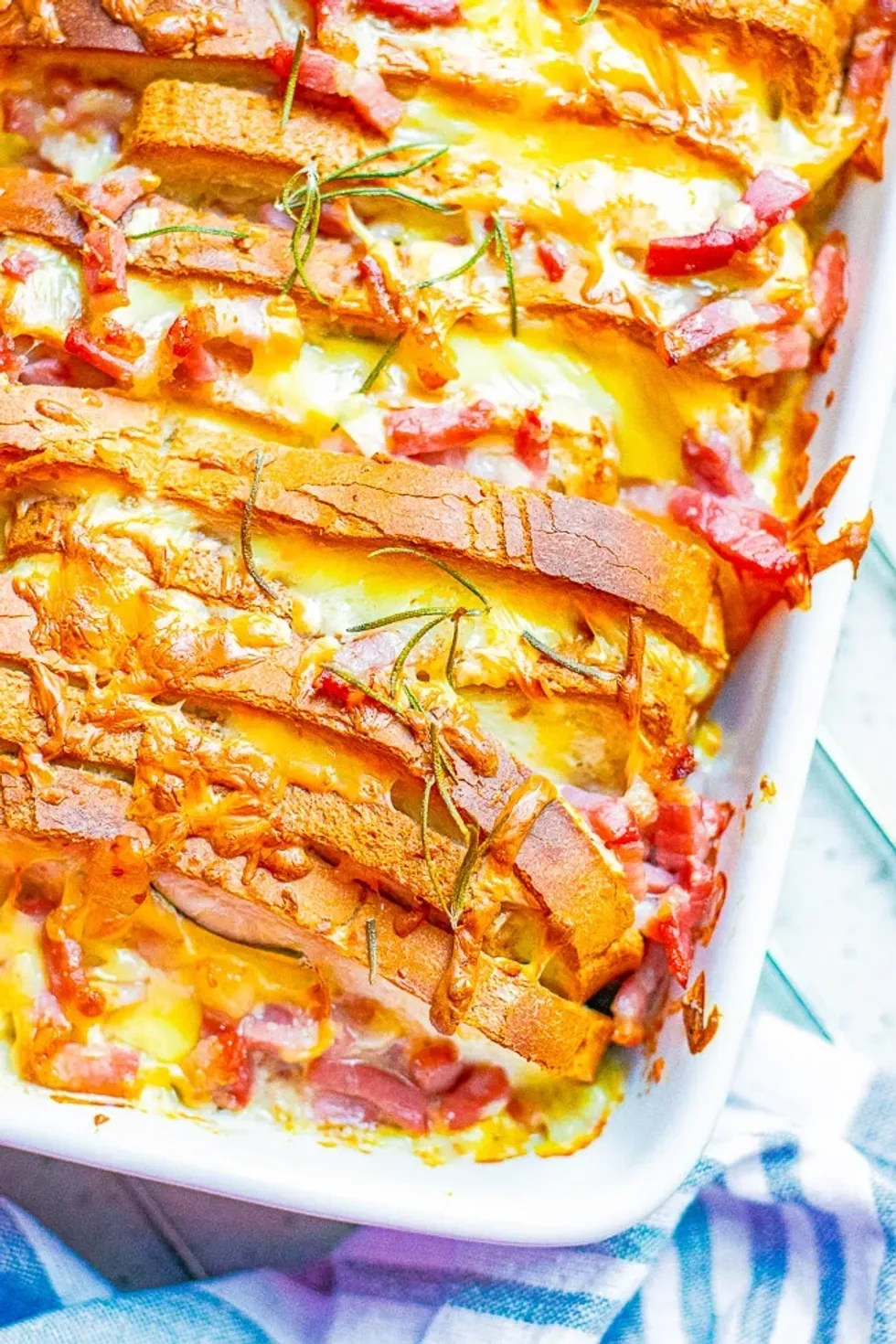 The side of a tray of bacon cheddar french toast