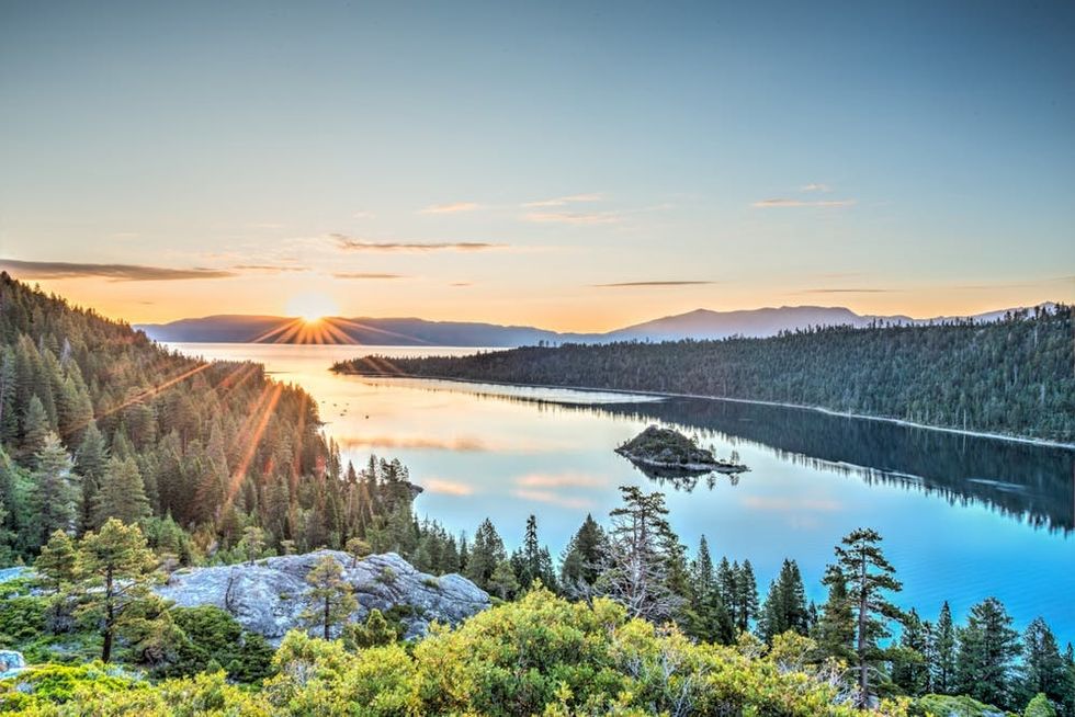 The sun rises over Lake Tahoe's Emerald Bay