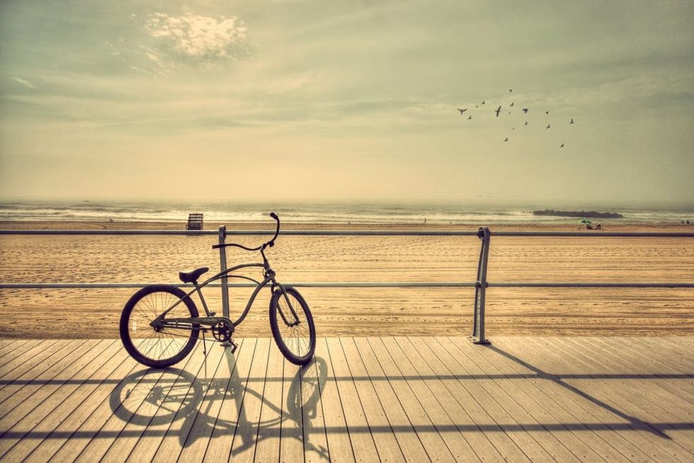 The sun shines on the Spring Lake boardwalk early in the morning