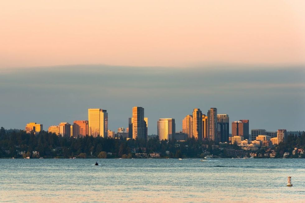 The sunset seen from Bellevue glints off sea and buildings