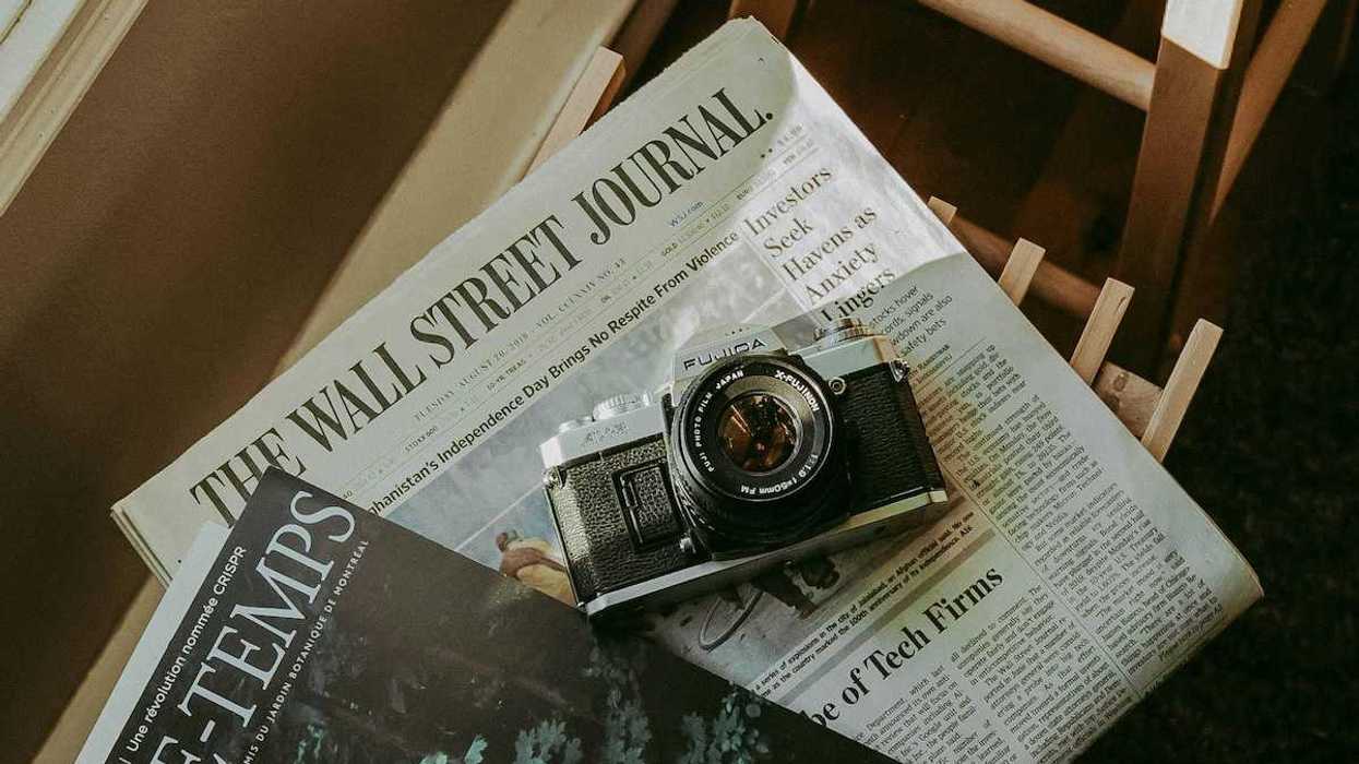the wall street journal with a camera
