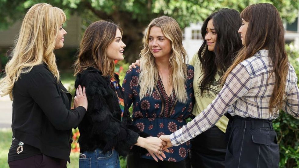 The women from Pretty Little Liars are sharing in a sentimental moment.