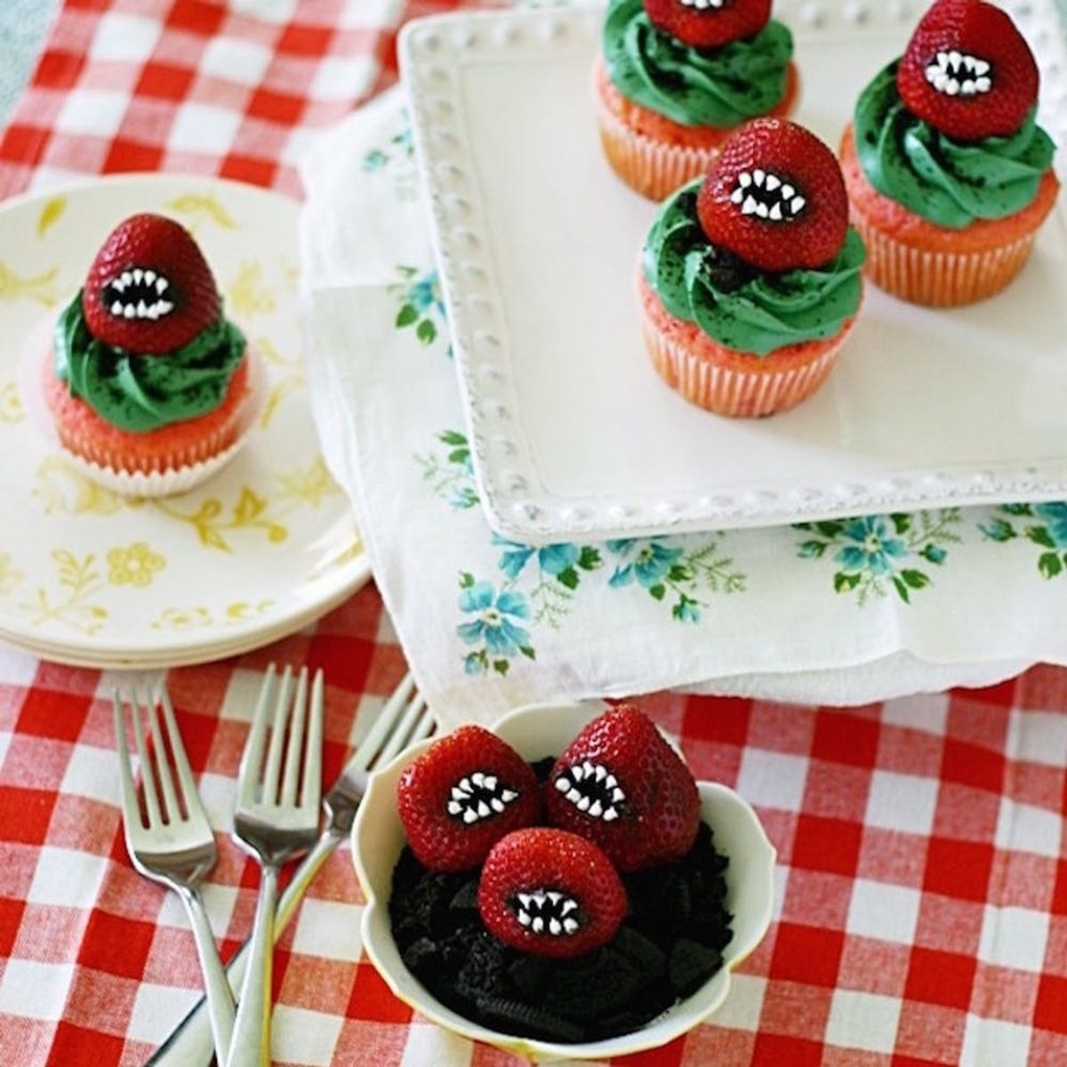 These Halloween Cupcake Ideas such as a venus fly trap and monster strawberries will get you in the spirit.