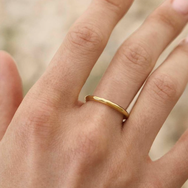 thin ring on hand