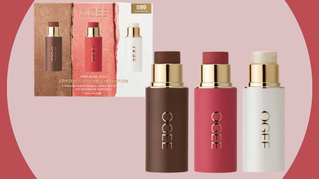 Three Ogee beauty sticks with packaging on a pink circular background.