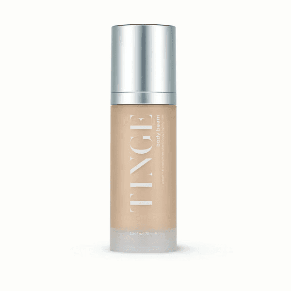 Tinted body lotion bottle with a silver cap, labeled "TINGE body beam."
