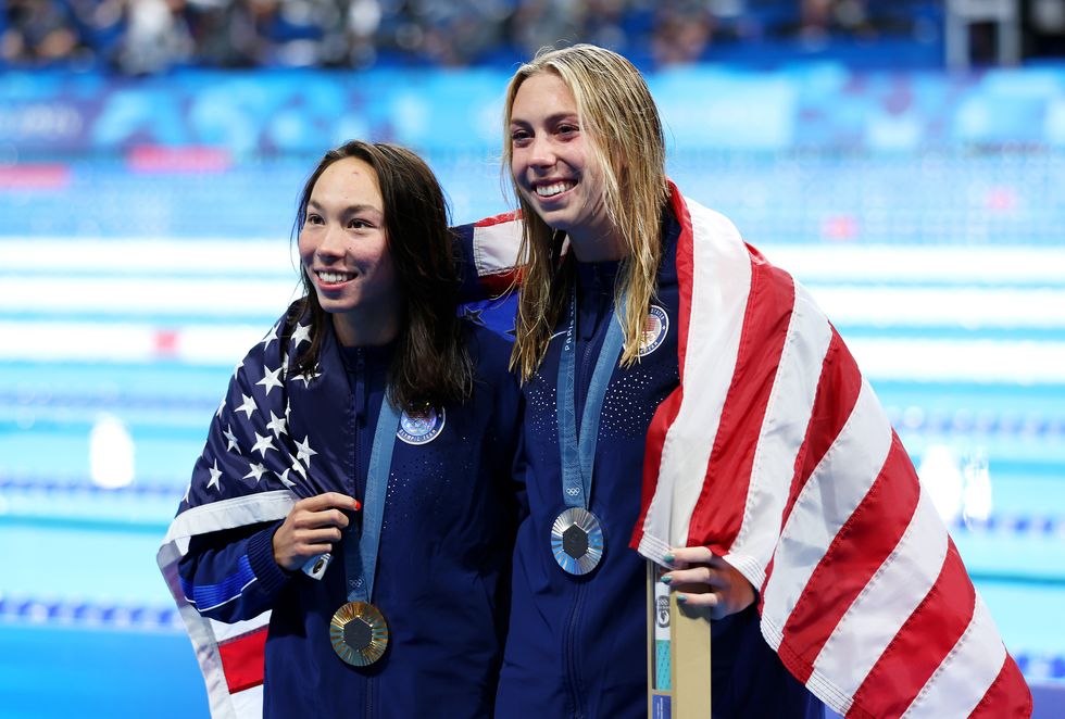 torri huske and gretchen walshe celebrating their gold and silver medals at the 2024 paris olympics