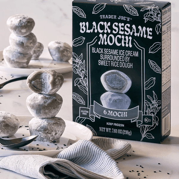 Trader Joe's February 2026 new items include vanilla cold brew concentrate, Patagonian scallops, and the return of black sesame mochi alongside rumors of a new micro tote bag collection.
