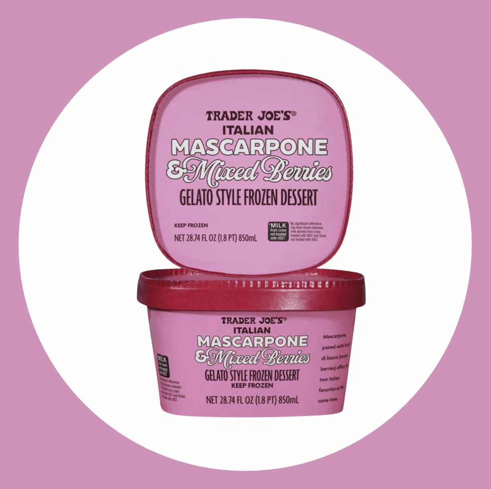 Trader Joe's mascarpone mixed berries gelato container on purple background.