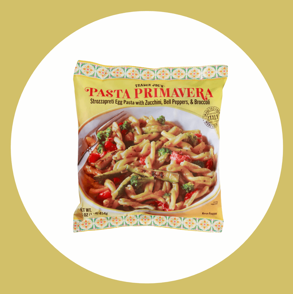Trader Joe's Pasta Primavera package with vegetables on a yellow and white background.