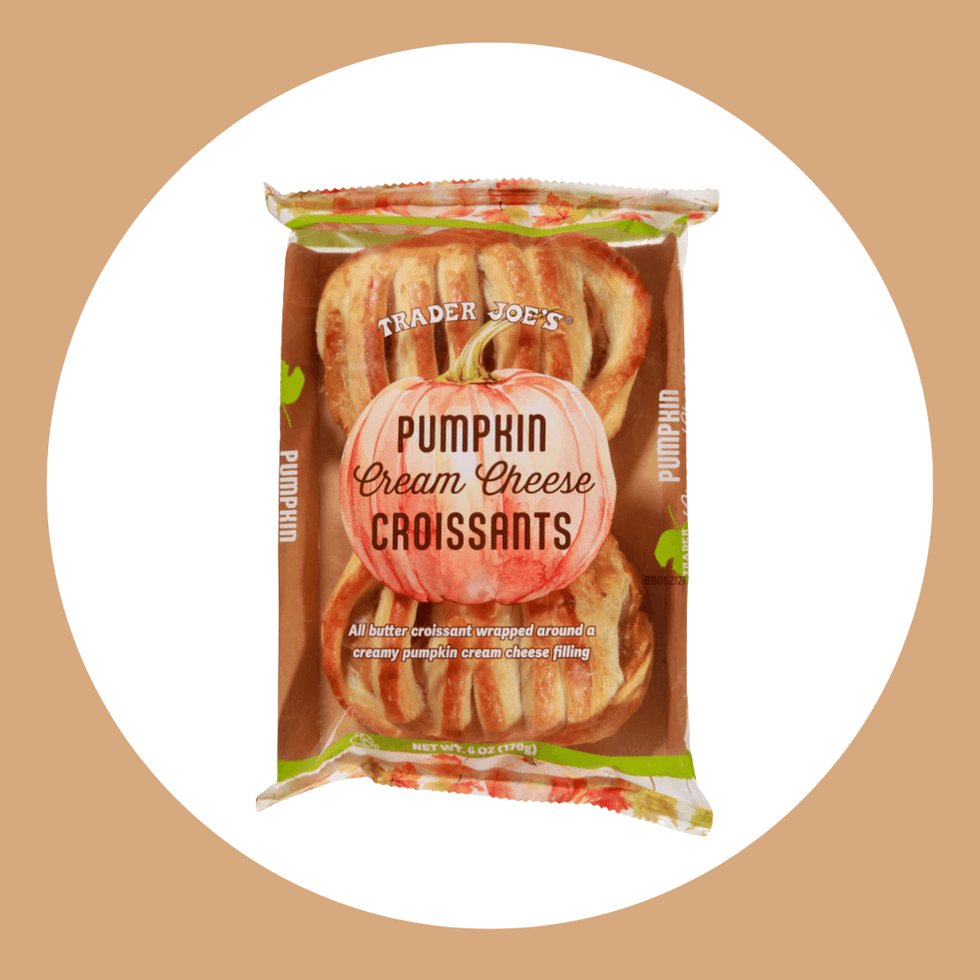 Trader Joe's Pumpkin Cream Cheese Croissants package on a tan background.