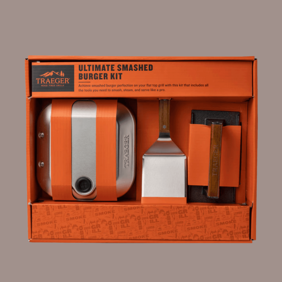 Traeger Ultimate Smashed Burger Kit with spatula, press, and steamer.