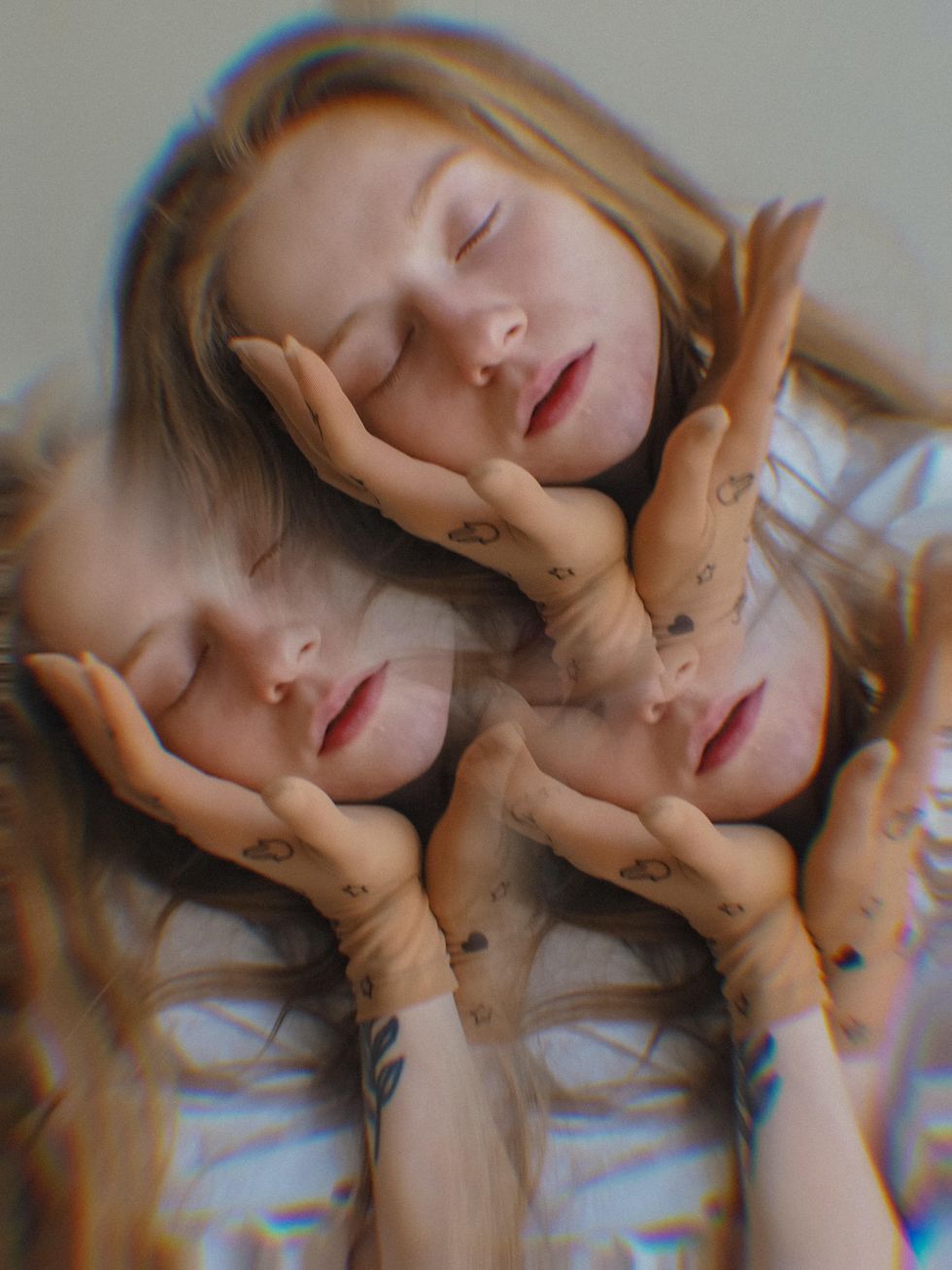 triple exposure photo of woman with eyes closed