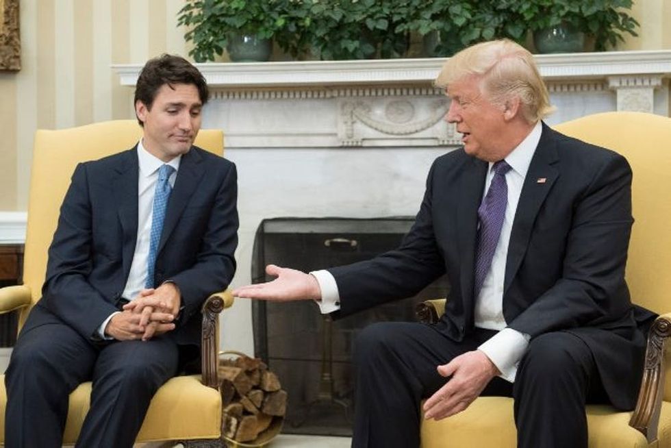 Trudeau and Trump handshake