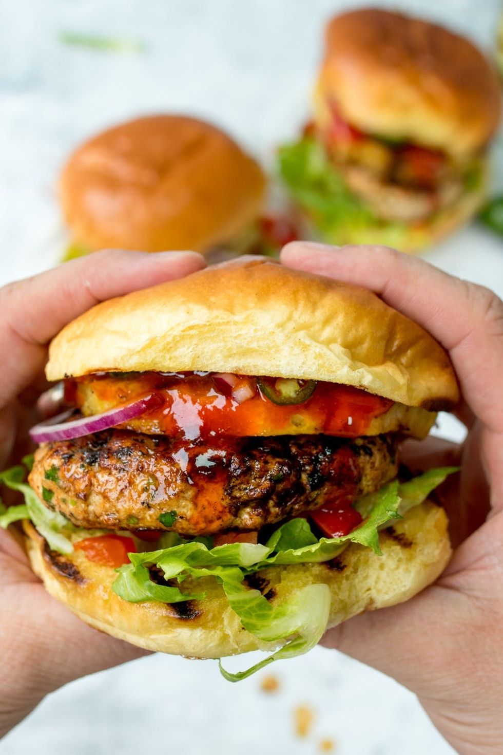 Try Our Hawaiian Salmon Burger With Grilled Pineapple Recipe For Your Weekend Barbecue!