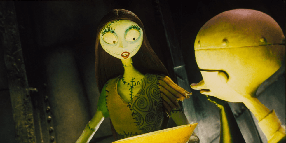 Two animated characters discussing over a bowl, one with stitched features.